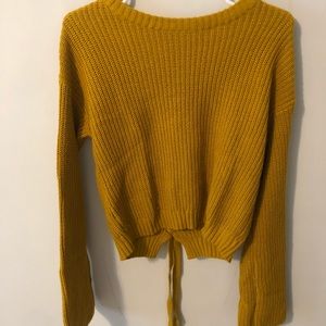 poof! gold sweater